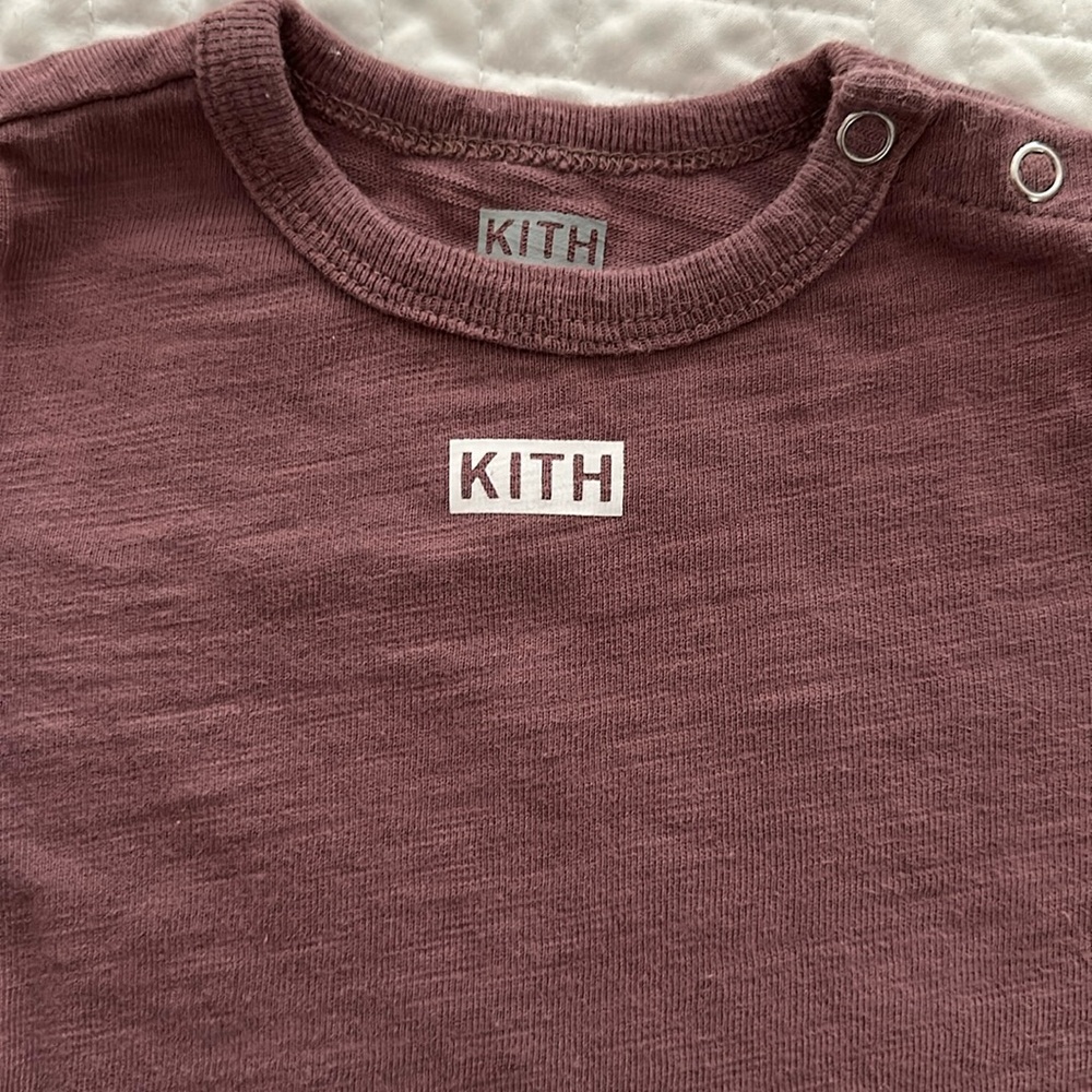 KITH. Purple/mauve onesie.